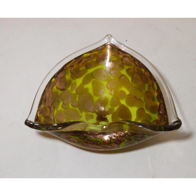 Up for sale is a nice quality vintage hand blown Murano art glass ashtray. It's blown out of thick green to yellow ombre...