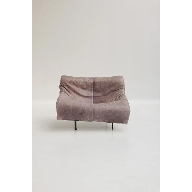 Butterfly lounge chair designed by Gerard van den Berg and produced by Montis. Gray leather seat suspended from a black...