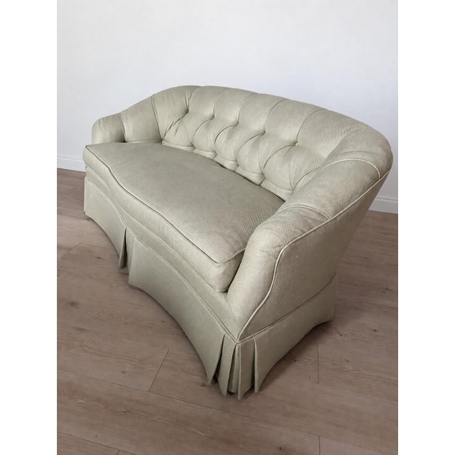 Century Furniture Loveseat with curved tuft back & tailored skirting. Original upholstery in a greige textured woven...