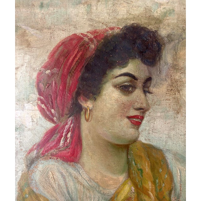 A beautifully executed 19th century oil on canvas portrait depicting a young Italian peasant girl dressed in traditional...