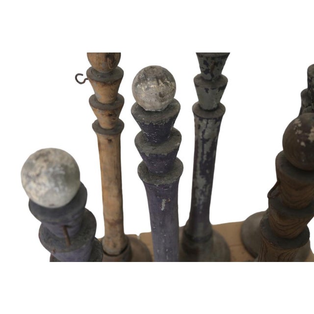 Number 8 original Pilastrini turned in Fir wood with iron base, still present the patina of the original paint. Recovered...