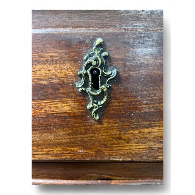 Magnificent secretary, chest of drawers or 18th century English scriban desk from the George III period in mahogany. This...