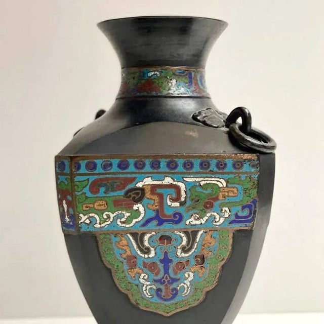 A bronze and cloisonne enamel square vase. cloisonne bronze vase, japan xix, signature cartridge. large quadrangular...