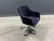 Ward Bennett office chairs in original navy blue mohair over stainless steel bases.