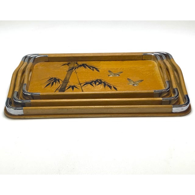 These trays are the 1940's style. Their intricate bamboo design and varying sizes, they're perfect! The largest tray...