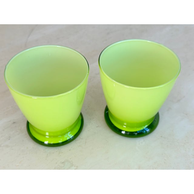 Set of 2 cased glasses in a bright lime green. Set of 3 taller orange glasses and 4 yellow are available separately in my...