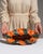 This 1960s platter from France is finished in burnt orange, worked in ceramic. Its form follows honest, well-proportioned...