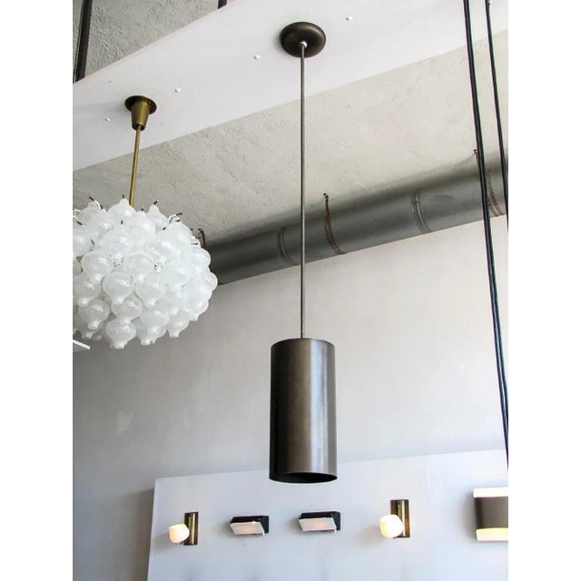 Stunning large scale cylindrical pendants in black/olive colored brushed anodized aluminum pendants by Prescolite,...