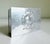 A handsome vintage silver-finish box featuring an embossed Roman gladiator motif on the lid. Rectangular in form with a...