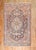 An authentic Persian Sarouk Farahan rug from the 2nd quarter of the 20th century with a traditional medallion border...