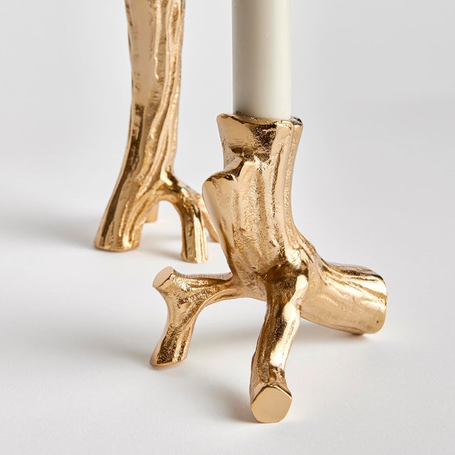 Made from handsculpted molds and in solid cast aluminum, these taper holders in warmGold are a substantial accent. Pair...