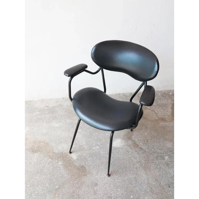 Mid-Century Black Painted Iron Frame and Black Skai Armchair by Gastone Rinaldi, 1950s, in Very Good conditions. Designed...