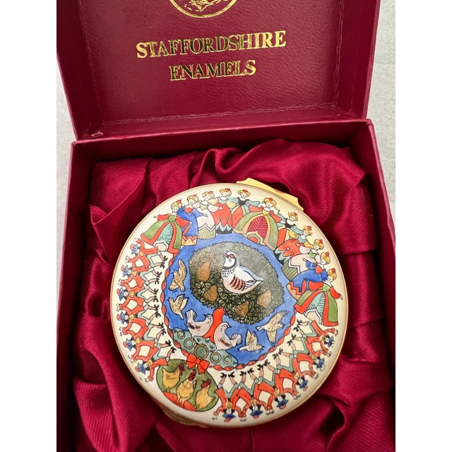 Staffordshire Enamels 12 day Christmas box, hand painted. The entire 12 days of Christmas is inscribed in the lid, with...