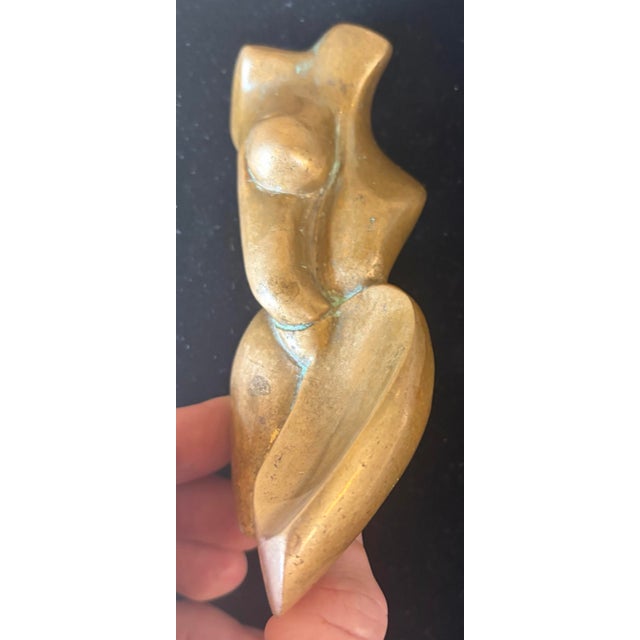DESCRIPTION Elevate your next styling project with this exceptional Mid-Century Modern abstract female nude sculpture....