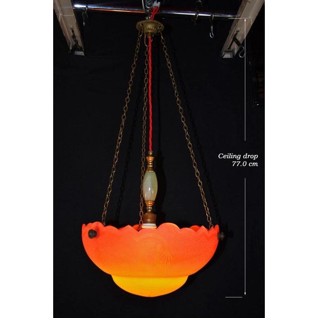 An elegant art deco plafonnier ceiling light dating to circa 1930, combining a beautifully worked glass bowl with...