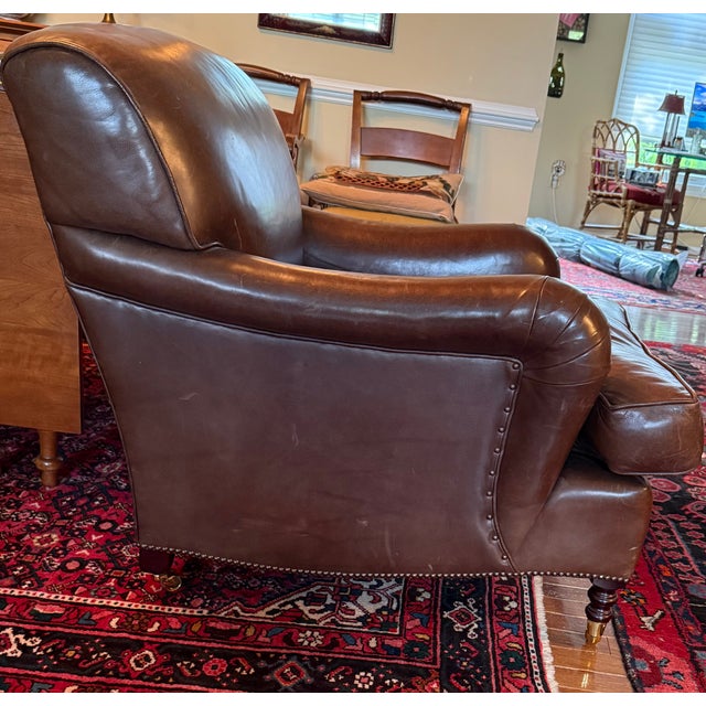 Heirloom quality bespoke George Smith "Standard Arm Signature chair" in brown leather in size medium (40" deep) and...