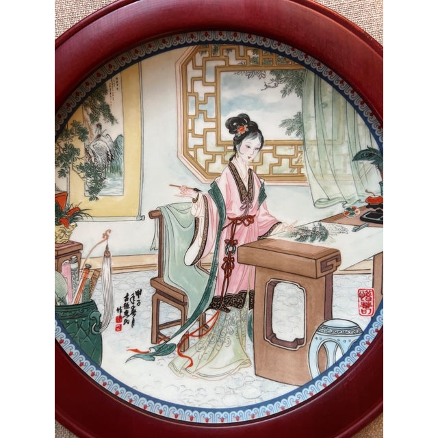 This is the Hsi-chun plate, the fourth plate of the Beauties of the Red Mansion series from the Imperial Jingdezhen...