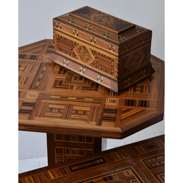 Vintage Exceptional Parquetry Pedestal Table with Hidden Compartment, Circa Mid 20th Century. A captivating example of...