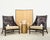 Stylish and rare pair of large lounge chairs or club chairs with matching ottoman designed in the California coastal...
