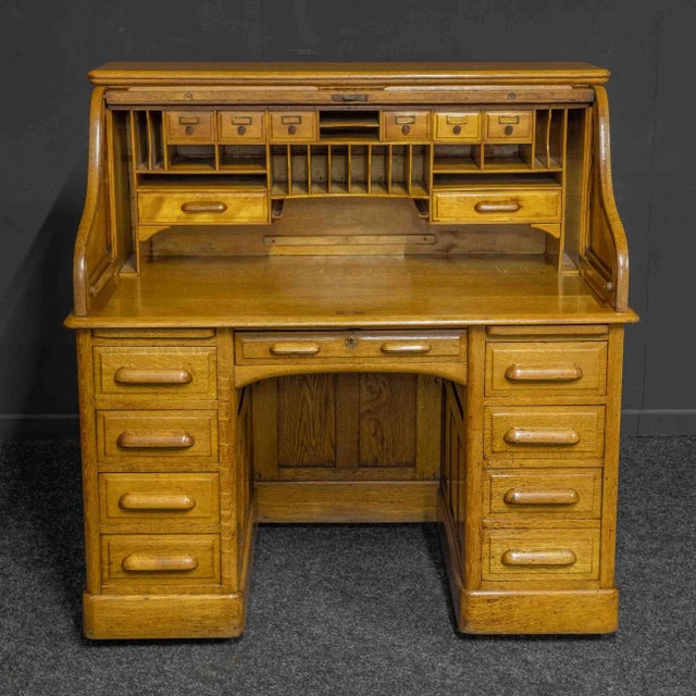 An Edwardian oak roll top desk with the lock plate reading 'Lebus Desk Co'. Of above average quality and in excellent...
