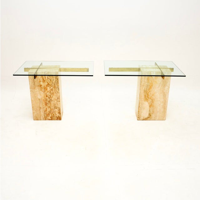 A stunning pair of vintage Italian travertine and brass side tables by Artedi. They were made in Italy, they date from the...