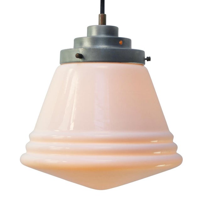 Reeded opaline glass pendant light by Philips, The Netherlands Metal top, 2 meter black wire E27/E26 This piece has an...