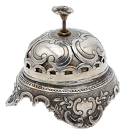Silver Table Bell with Reliefs and Cutouts