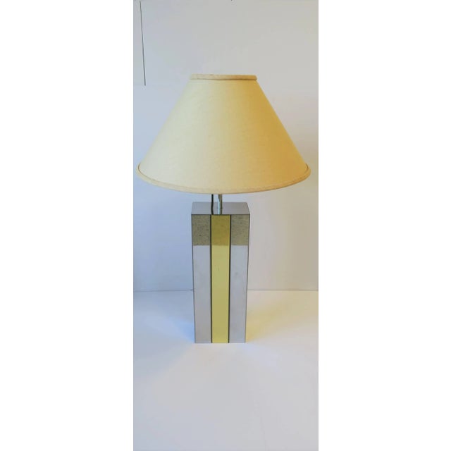A Robert Sonneman designed rectangular chrome and brass table lamp, '70 Modern design, circa 1970s, USA. Chrome with brass...