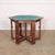 Late 19th Century Arts and Crafts octagonal games table with a green felt top. This table has decorated legs with carved...