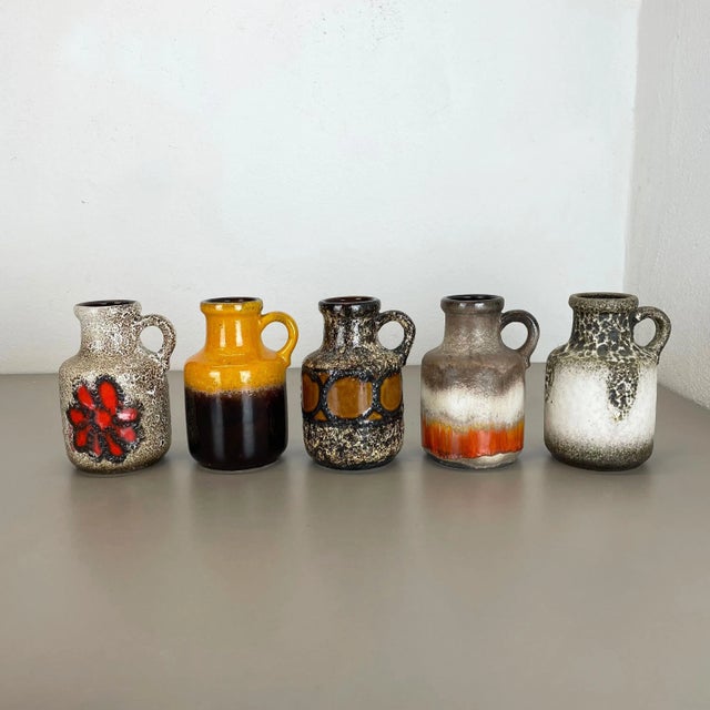 Set of five fat lava art vases Model: 414-16 Producer: Scheurich, Germany Decade: 1970s These original vintage vases was...