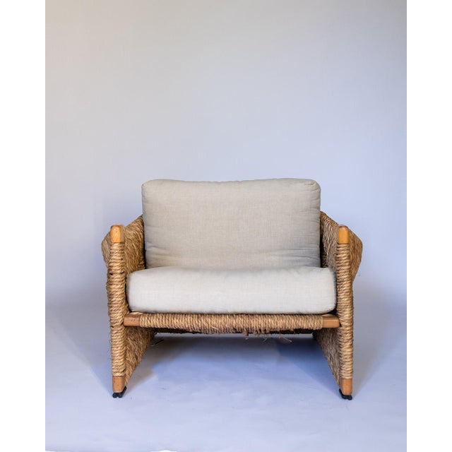 Rare Mario Bellini 'Papiro' Armchair. Italy, c 1970 Wood, braided hemp rope, upholstery fabric. Good overall condition....