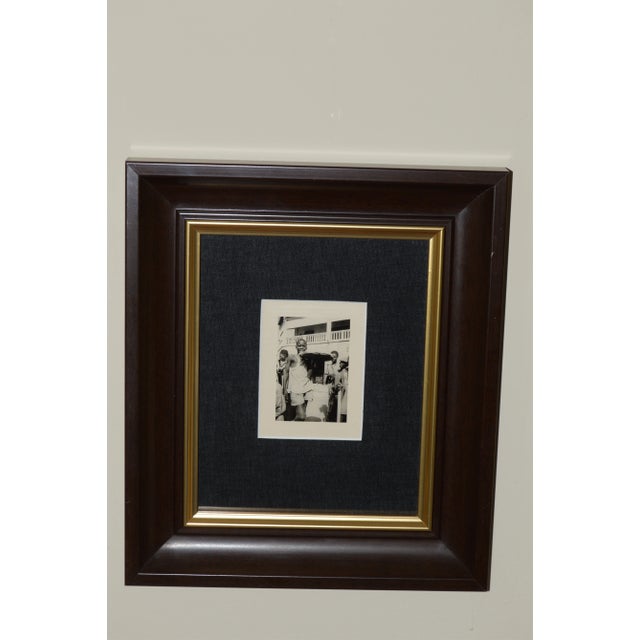 Original vintage black & white w/sepia tone photograph with Margins. African boy in market scene. Ready to hang in acid...