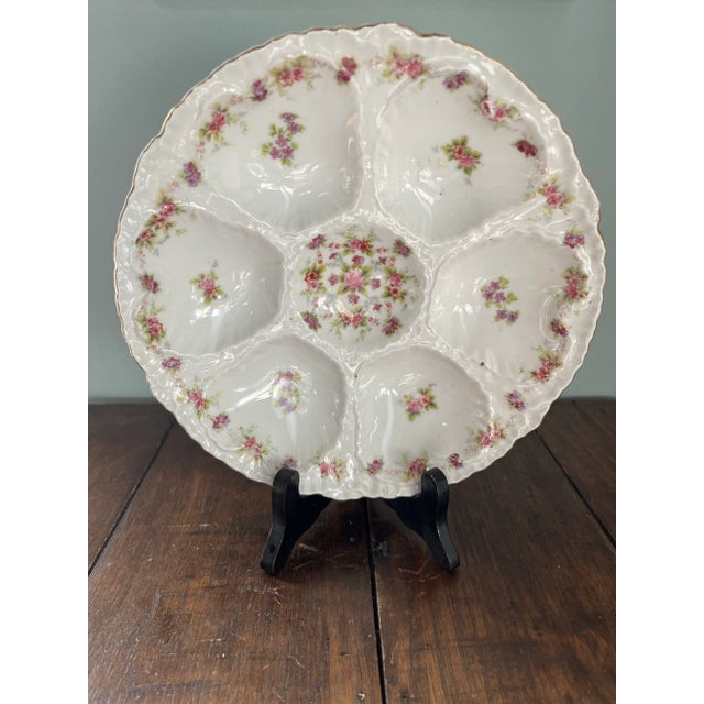 Antique oyster dish with rose motif marked Victoria Carlsbad Austria dated between 1891 to 1918