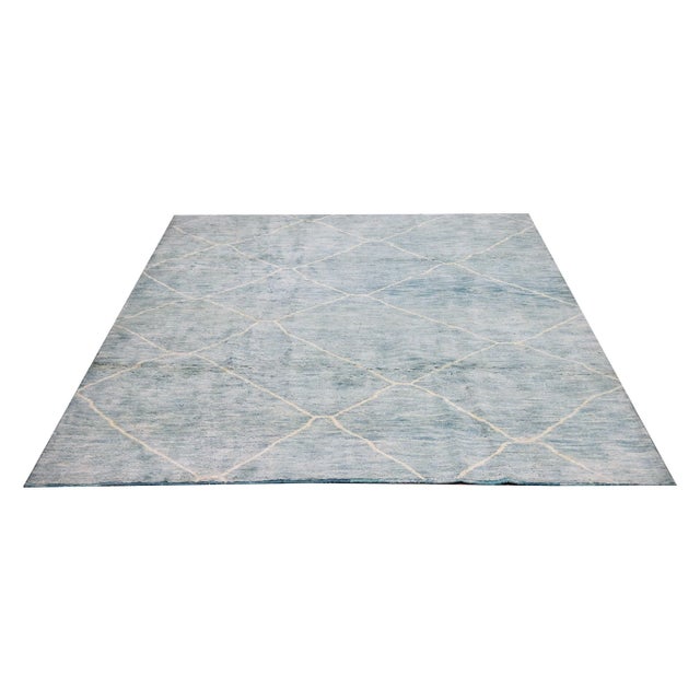 Moroccan Beni Ourain hand knotted rug with natural colors, contemporary style and soft texture.