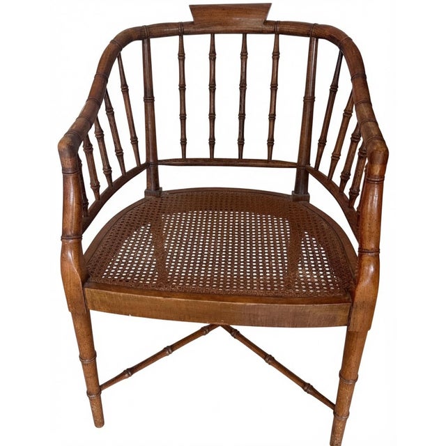 The ultimate accent chair! This chair exemplifies the Regency Revival style, a popular 20th-century aesthetic that honors...