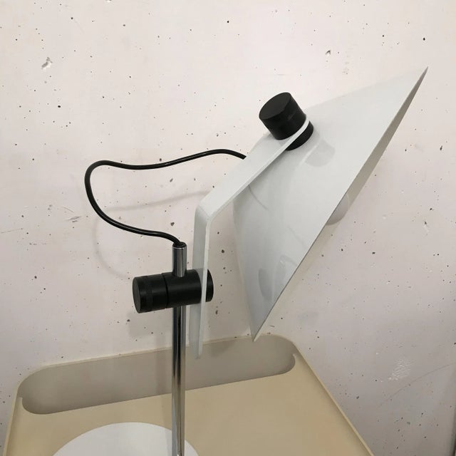 White lacquered metal lamp probably Italian circa 1970. Perfect state. I have official proof of authenticity such as...