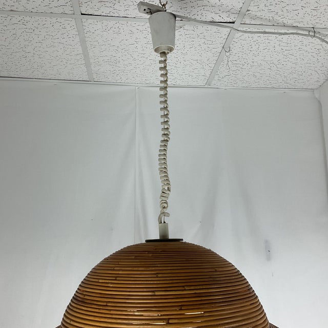 Add warmth and character to your space with this vintage rattan pendant light shade. Featuring a distinctive dome-shaped...