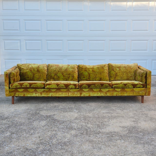 This is a signed DUX midcentury modern tuxedo sofa covered in original Jack Lenor Larsen velvet upholstery. The original...
