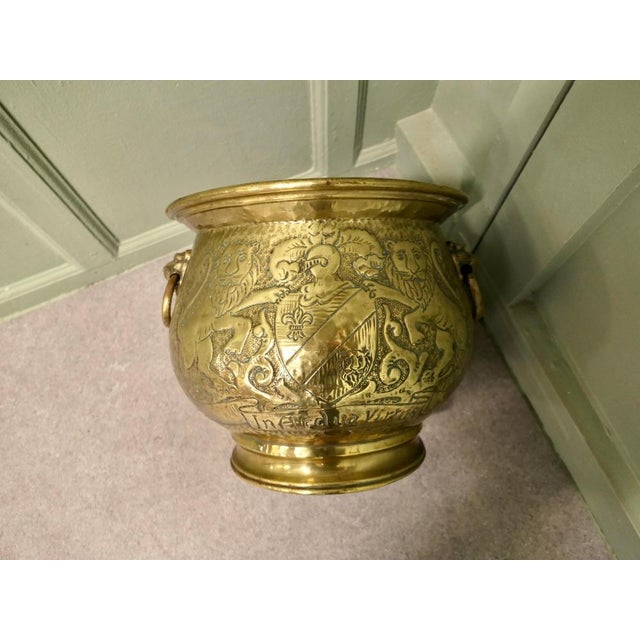 19th Century Gothic Brass Jardiniere with Shields This is a very old piece it is decorated with Lions and Shields and it...