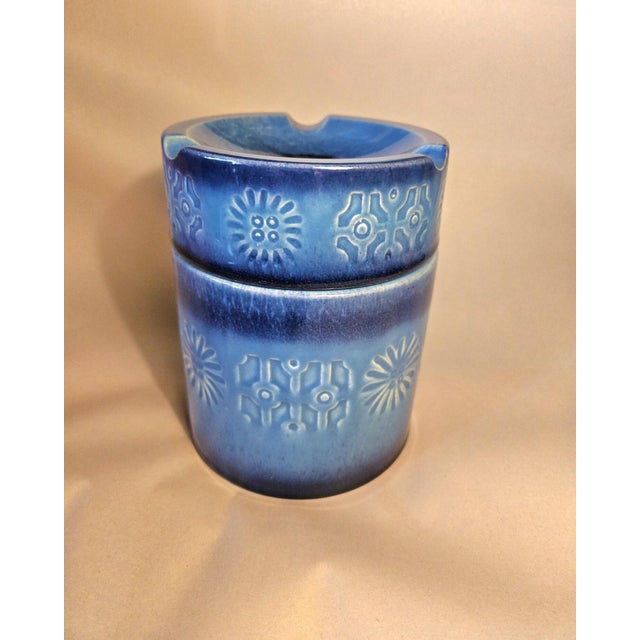 This is a Mid Century Danish Modern Humidor and Ashtray Canister. It's done in a glazed rich and varied Turquoise blue...