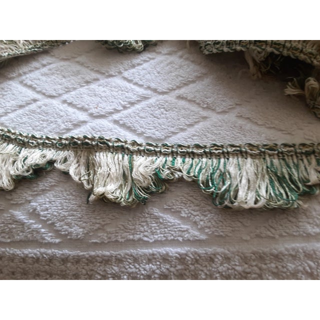 Greatly already discounted to maximum. Sought after coloration. Very versatile, contemporary, green,black, and white top...