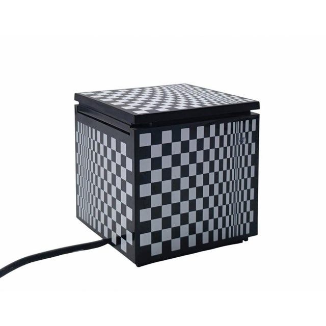 Cuboluce table lamp by Cini&Nils, 1970s. Plastic body with a chequerboard pattern. The Cuboluce lamp is ideal for reading...