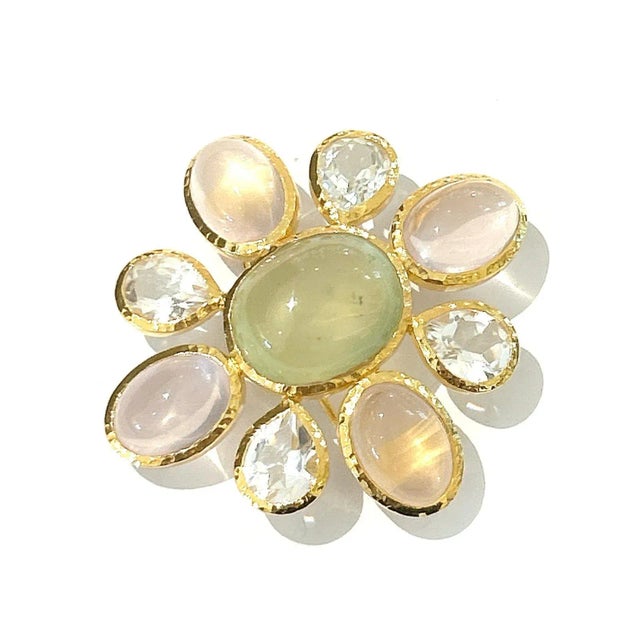 This is part of Chairish’s Fine Jewelry assortment. Natural Rose Quartz, Oval shape - 25 carat Natural White Topaz from...