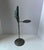 A striking Brutalist-style sculptural object featuring a cast art glass fox set within a hand-welded metal stand. The...