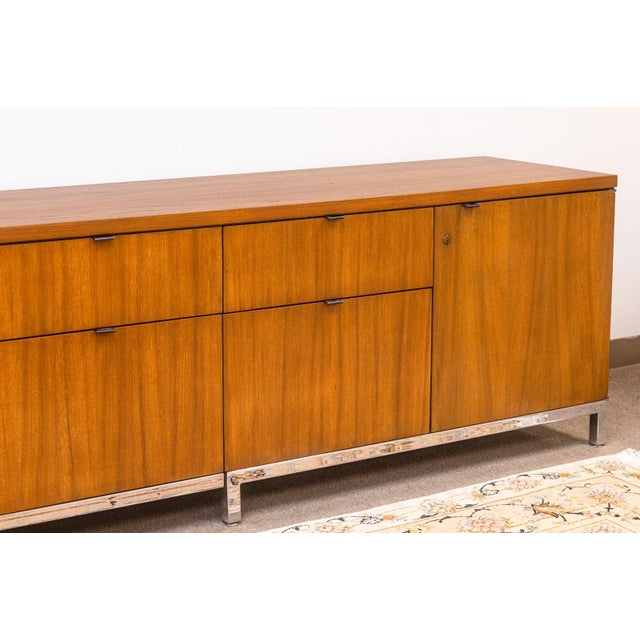 A vintage Florence Knoll executive office credenza. This is a beautifully refinished mid century cabinet. It is in...