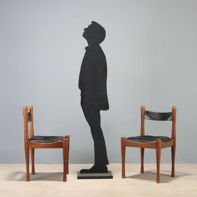 Set of six chairs designed by Silvio Coppola and manufactured by Bernini in the 1970s. These chairs feature a beechwood...