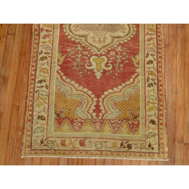 Red color formal traditional Turkish rug from the middle of the 20th century. Measures: 3'2'' x 6'6''.