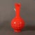 This large early 1950s red Murano glass pitcher features numerous knobs and a white twisted handle.
