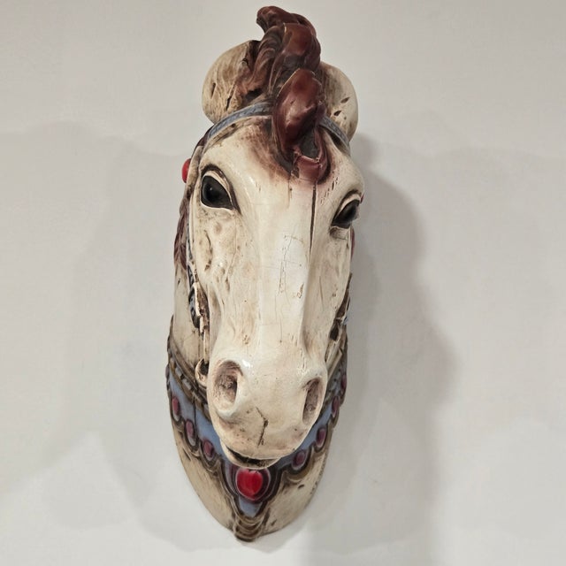 Alfco-NY carousel horse head wall mount sculpture features a vintage-inspired aesthetic with a cream-colored base and deep...