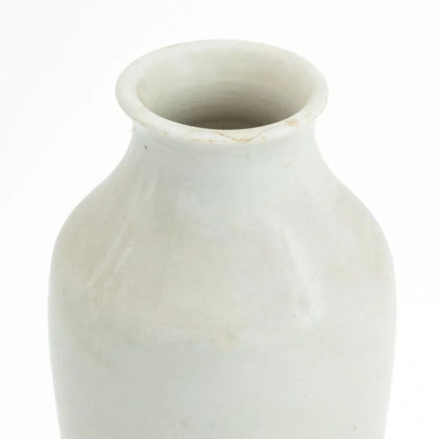 Chinese White Porcelain Bottle Vase. 7.5" H x 3" Diameter. Provenance: From a 35 East 75th Street Estate.